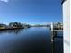 Wide view of the calm waterway and neighboring houses at 2601 W Marion Ave # 45C, Punta Gorda, FL 33950