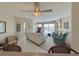 Open living room with water views, comfy seating and kitchen access at 2601 W Marion Ave # 45C, Punta Gorda, FL 33950