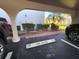 Assigned parking spot under covered carport at 2601 W Marion Ave # 45C, Punta Gorda, FL 33950