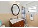 Clean bathroom with a vanity, shower, and updated fixtures at 312 E Tarpon Nw Blvd, Port Charlotte, FL 33952