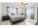 Bright bedroom featuring a comfortable bed and plenty of natural light at 312 E Tarpon Nw Blvd, Port Charlotte, FL 33952