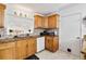 Kitchen with granite countertops and light wood cabinets at 312 E Tarpon Nw Blvd, Port Charlotte, FL 33952