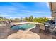 Relaxing pool area with patio furniture and water view at 312 E Tarpon Nw Blvd, Port Charlotte, FL 33952