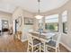 Bright breakfast nook with window seating and a view of the backyard at 316 Antis Dr, Rotonda West, FL 33947