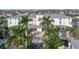 Condo building with parking and tropical landscaping at 3640 Bal Harbor Blvd # 313, Punta Gorda, FL 33950