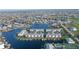 Aerial view of waterfront community with boat slips and pool at 3640 Bal Harbor Blvd # 313, Punta Gorda, FL 33950