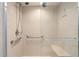 Walk-in shower with grab bars and built-in seat at 3640 Bal Harbor Blvd # 313, Punta Gorda, FL 33950