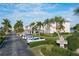 Community entrance with parking and lush landscaping at 3640 Bal Harbor Blvd # 313, Punta Gorda, FL 33950