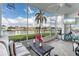 Spacious waterfront patio with seating and water views at 3640 Bal Harbor Blvd # 313, Punta Gorda, FL 33950