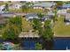 Aerial view of canal-front property with private dock at 4127 Gardner Dr, Port Charlotte, FL 33952