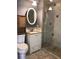 Updated bathroom with walk-in shower and vanity at 4127 Gardner Dr, Port Charlotte, FL 33952