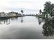 Peaceful canal view with neighboring homes and docks at 4127 Gardner Dr, Port Charlotte, FL 33952