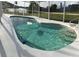 Inviting kidney-shaped pool, perfect for relaxation at 4127 Gardner Dr, Port Charlotte, FL 33952