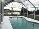 Enjoy this relaxing pool with a view of the canal at 4127 Gardner Dr, Port Charlotte, FL 33952