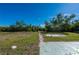 Wooden dock on the water with surrounding mangroves at 414 Glenholm Ave, Punta Gorda, FL 33950