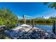 Wooden dock with lift, offering waterfront access at 414 Glenholm Ave, Punta Gorda, FL 33950