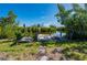 A dock with two lifts on the water next to mangroves at 414 Glenholm Ave, Punta Gorda, FL 33950