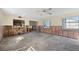 Living room with exposed walls and flooring, ready for renovation at 414 Glenholm Ave, Punta Gorda, FL 33950