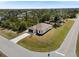 Single story house with a large yard and surrounding landscape at 509 Sunset N Rd, Rotonda West, FL 33947