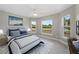 Bedroom with window seating and ceiling fan at 509 Sunset N Rd, Rotonda West, FL 33947