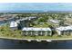 Aerial view of waterfront condo community with pool and boat slips at 601 Shreve St # 46A, Punta Gorda, FL 33950