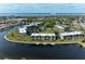 Aerial view of waterfront condo community with pool and boat slips at 601 Shreve St # 46A, Punta Gorda, FL 33950