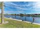 Private dock with scenic canal views and lush green space at 601 Shreve St # 46A, Punta Gorda, FL 33950