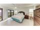 Main bedroom with king-size bed and water view at 601 Shreve St # 46A, Punta Gorda, FL 33950