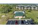 Community pool with lounge chairs and landscaping at 601 Shreve St # 46A, Punta Gorda, FL 33950