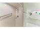 Large walk-in shower with grab bar and tiled walls at 601 Shreve St # 46A, Punta Gorda, FL 33950