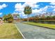 Landscaped bocce ball court overlooking a tranquil waterway at 604 Foxwood Blvd, Englewood, FL 34223