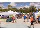 Outdoor farmers market with various vendors at 604 Foxwood Blvd, Englewood, FL 34223