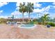 Relaxing hot tub area next to the pool, with comfortable seating and landscaping at 604 Foxwood Blvd, Englewood, FL 34223