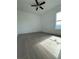 Bright bedroom with ceiling fan and wood-look flooring at 6202 Sweden Blvd, Punta Gorda, FL 33982