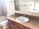 Clean bathroom with tub, shower, and vanity at 6379 Grand Cypress Blvd, North Port, FL 34287