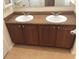 Double vanity with granite countertop at 6379 Grand Cypress Blvd, North Port, FL 34287