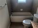 Clean bathroom with tub and shower at 6379 Grand Cypress Blvd, North Port, FL 34287