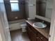 Clean bathroom with tub, shower, and vanity at 6379 Grand Cypress Blvd, North Port, FL 34287