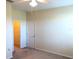 Bright bedroom with neutral walls, carpet, and a ceiling fan at 6379 Grand Cypress Blvd, North Port, FL 34287