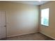 Bedroom with neutral walls and carpet at 6379 Grand Cypress Blvd, North Port, FL 34287