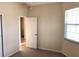 Bright bedroom with neutral walls and carpet at 6379 Grand Cypress Blvd, North Port, FL 34287