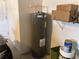 Large water heater in garage area at 6379 Grand Cypress Blvd, North Port, FL 34287