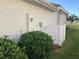 Exterior side view, showing a white vinyl fence at 6379 Grand Cypress Blvd, North Port, FL 34287