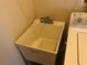 Utility sink in laundry room at 6379 Grand Cypress Blvd, North Port, FL 34287