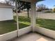 Screened patio overlooking a grassy backyard at 6379 Grand Cypress Blvd, North Port, FL 34287