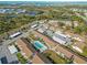 Community overview featuring multiple buildings and a pool at 6796 Gasparilla Pines Blvd # 77, Englewood, FL 34224