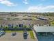 Aerial showing building and parking at 6796 Gasparilla Pines Blvd # 77, Englewood, FL 34224