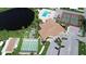 Community features pool, tennis courts, and clubhouse at 739 Tangerine Woods Blvd, Englewood, FL 34223