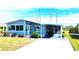 Updated manufactured home with covered parking at 739 Tangerine Woods Blvd, Englewood, FL 34223