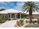 Luxury home with circular driveway and landscaping at 920 Via Tripoli, Punta Gorda, FL 33950